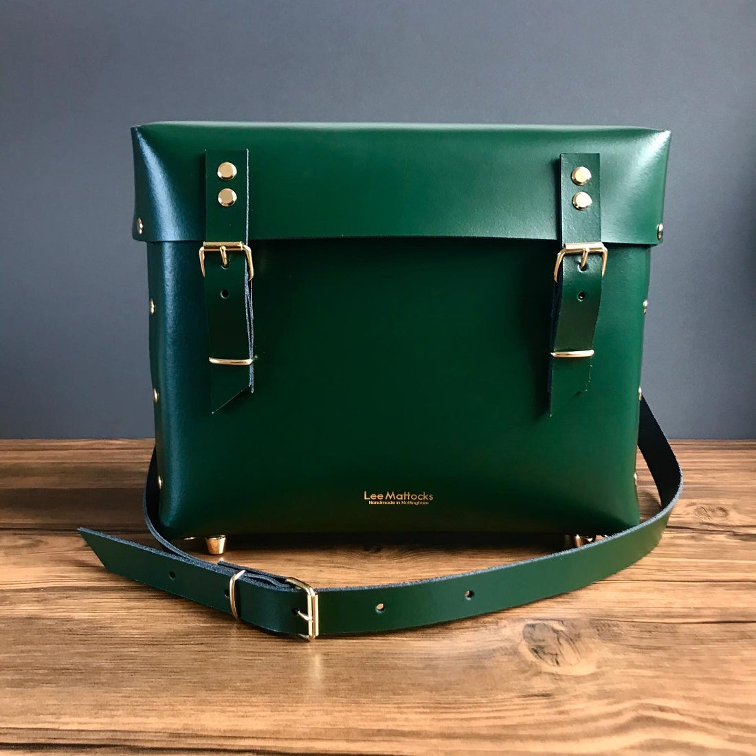 Racing green leather satchels