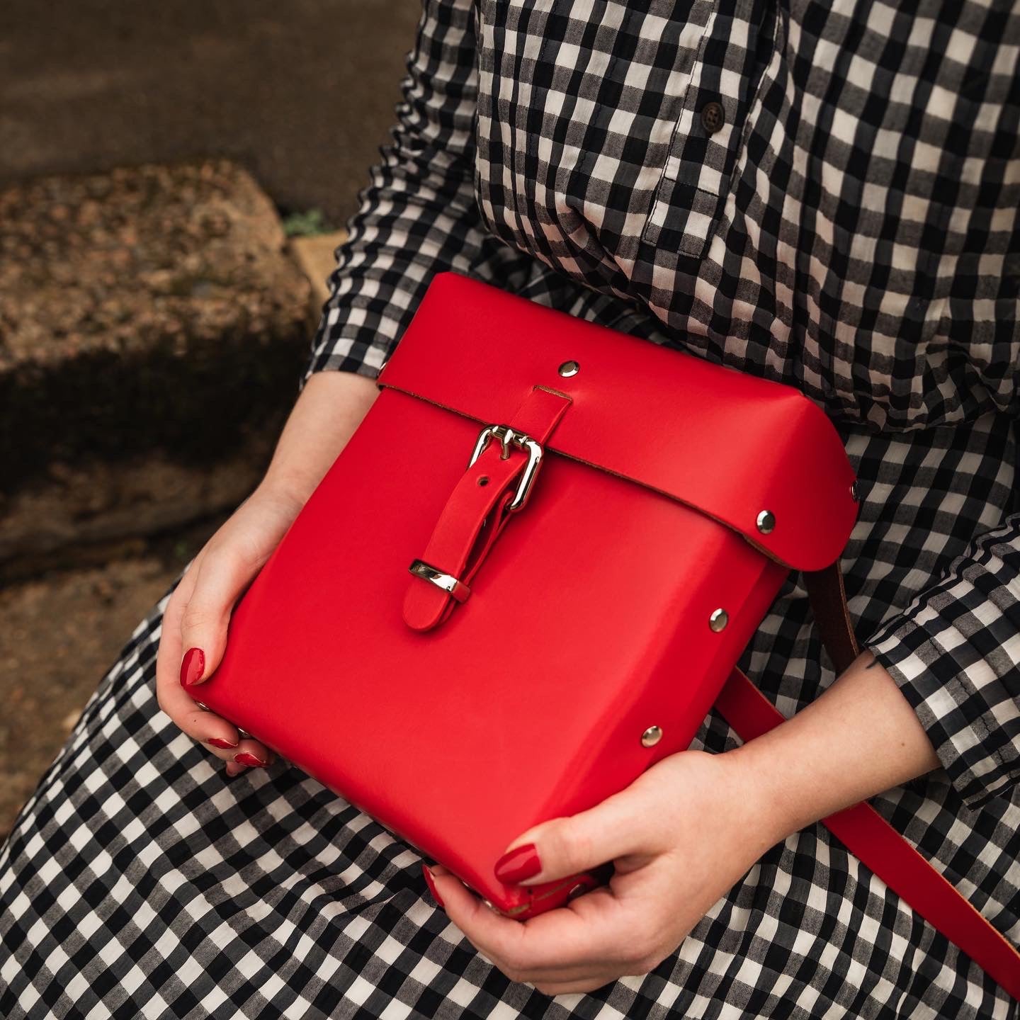 Red leather box bags, satchels and accessories. All handmade responsibly in vegetable tanned red leather and quality silver hardware. Limited edition and sustainable while inspired by classic fashion vintage fashion styles and modern art. 