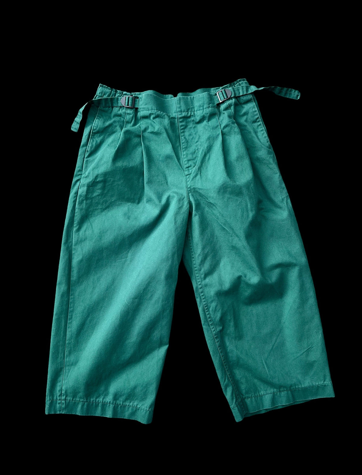 Front view of the green All Day Trouser developed through Welcome to Our Wardrobe research