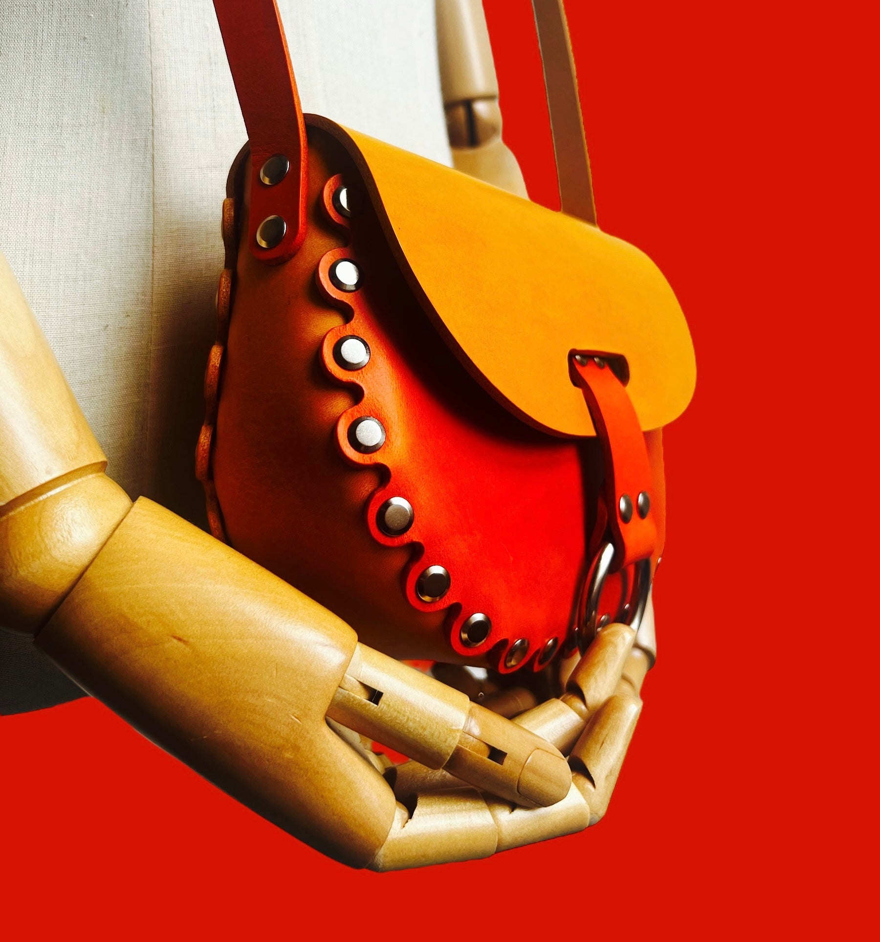 Multi colour saddle bag in vegetable tanned leather